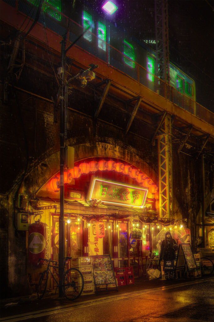 Illuminated izakaya entrance under an elevated train bridge in Shinbashi, Tokyo, red lanterns glowing in the rain, train passing overhead, cyberpunk atmosphere