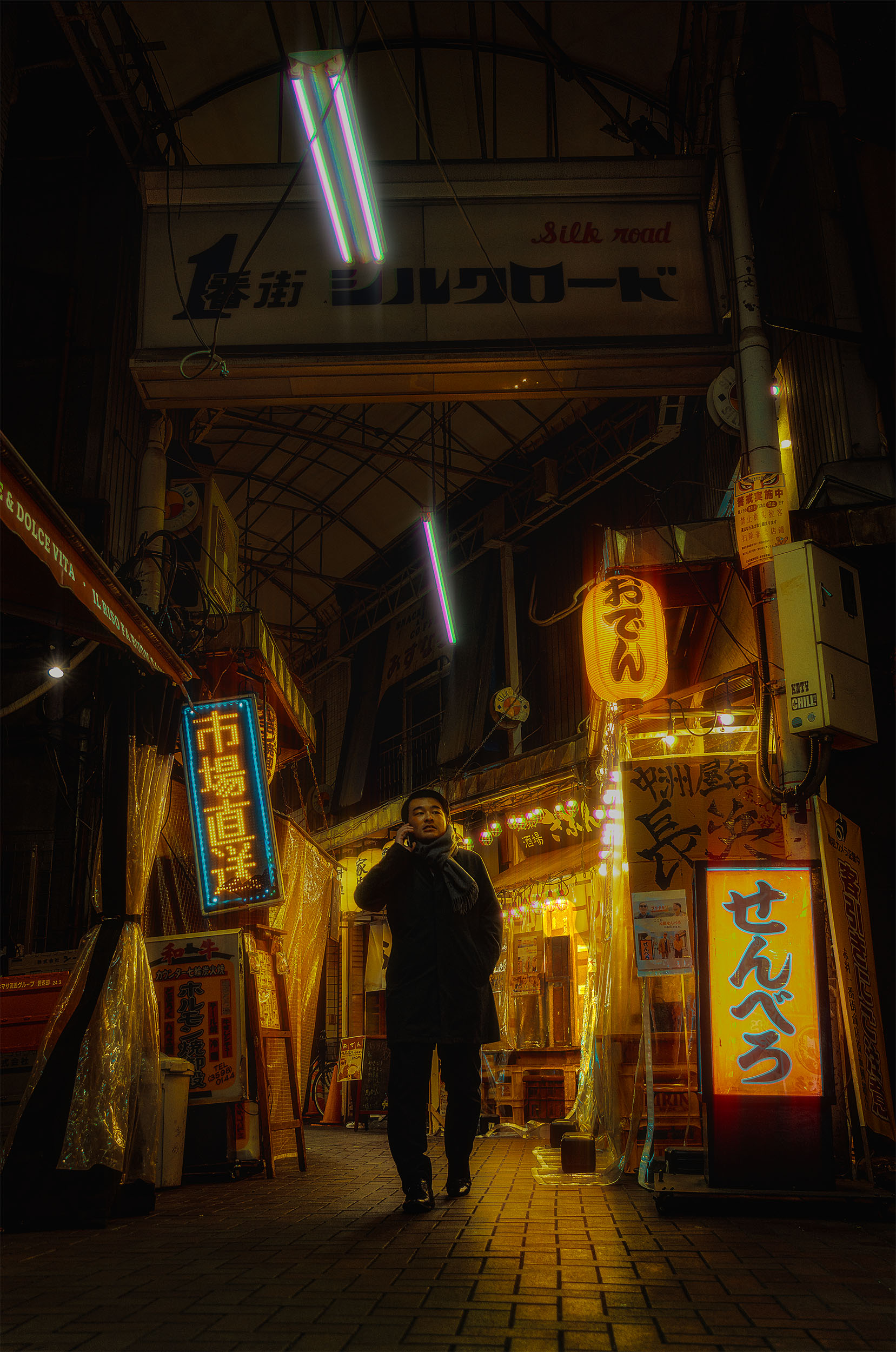 Lone figure on a phone call walking through a covered shotengai shopping arcade at night in Tokyo, neon signs and red lanterns illuminating the narrow street, cyberpunk atmosphere