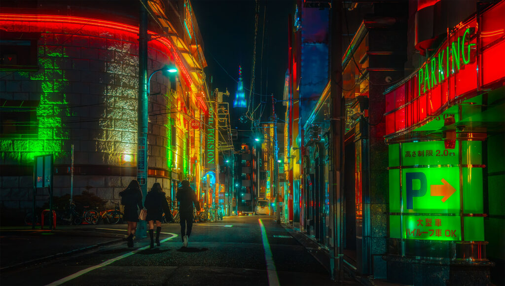Three figures walking down a neon-lit street in Kabukicho at night, Tokyo, Japan, colorful neon signs and illuminated buildings on both sides, tower visible in the distance, cyberpunk atmosphere