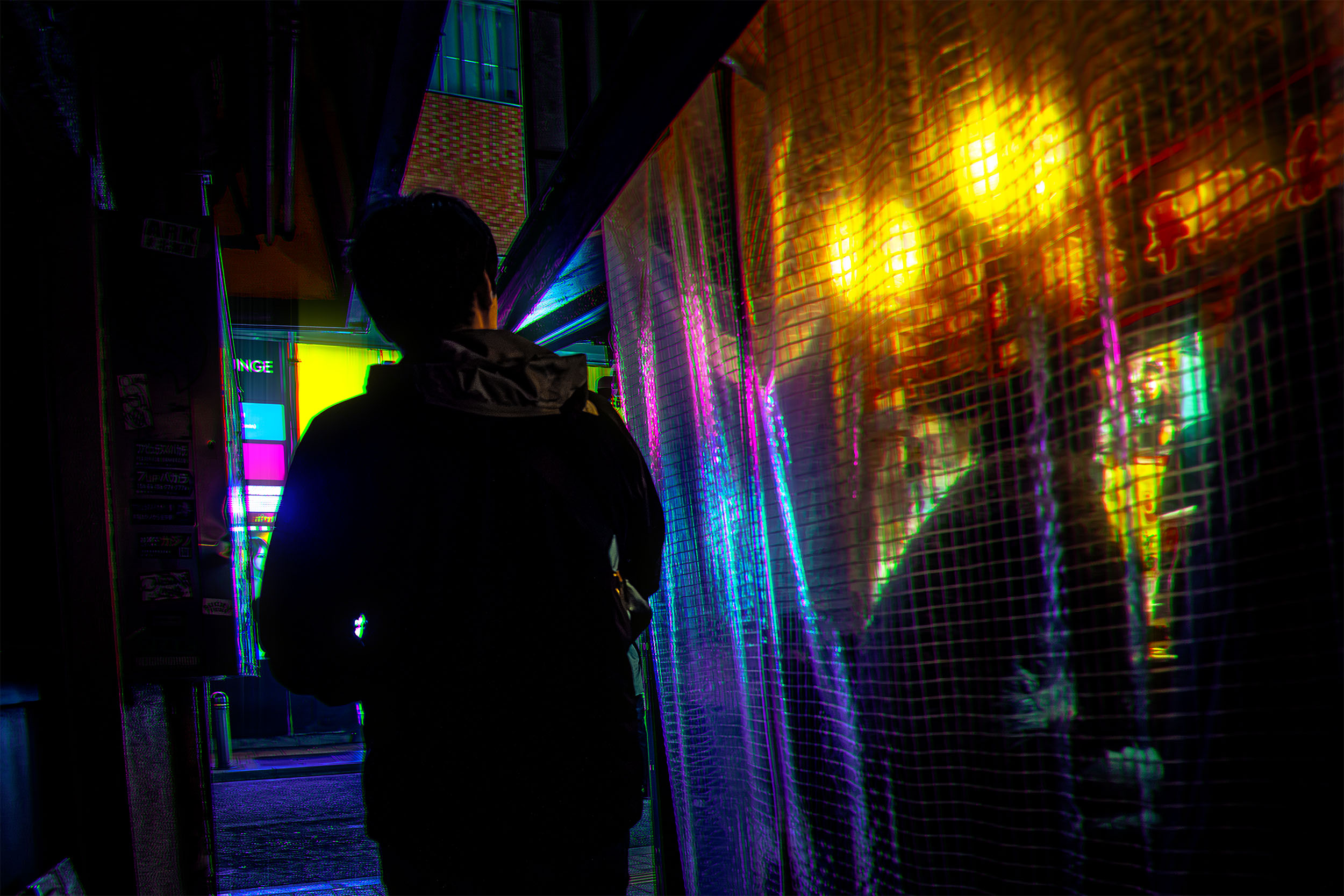 Lone silhouette walking past a shimmering metallic curtain reflecting neon lights at night in Kabukicho, Tokyo, Japan, colorful reflections of purple, yellow and green, cyberpunk atmosphere