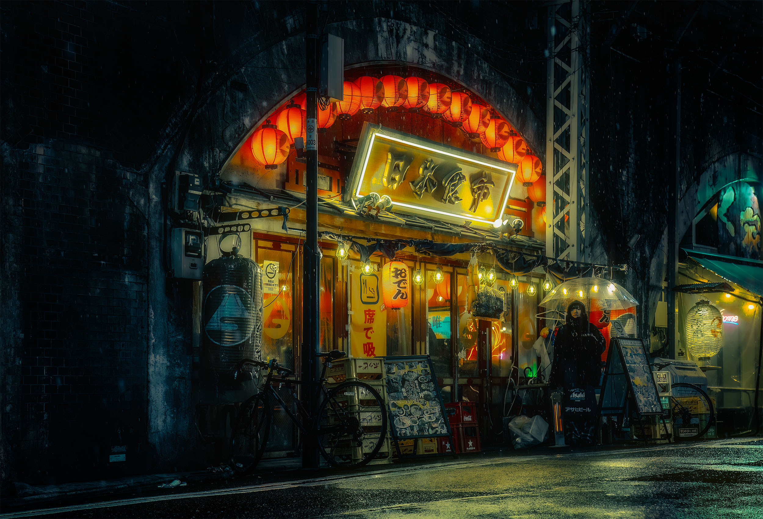 Person with umbrella standing outside an illuminated izakaya under an elevated train bridge in Shinbashi, Tokyo, red paper lanterns forming an arch overhead, falling snow, cyberpunk atmosphere