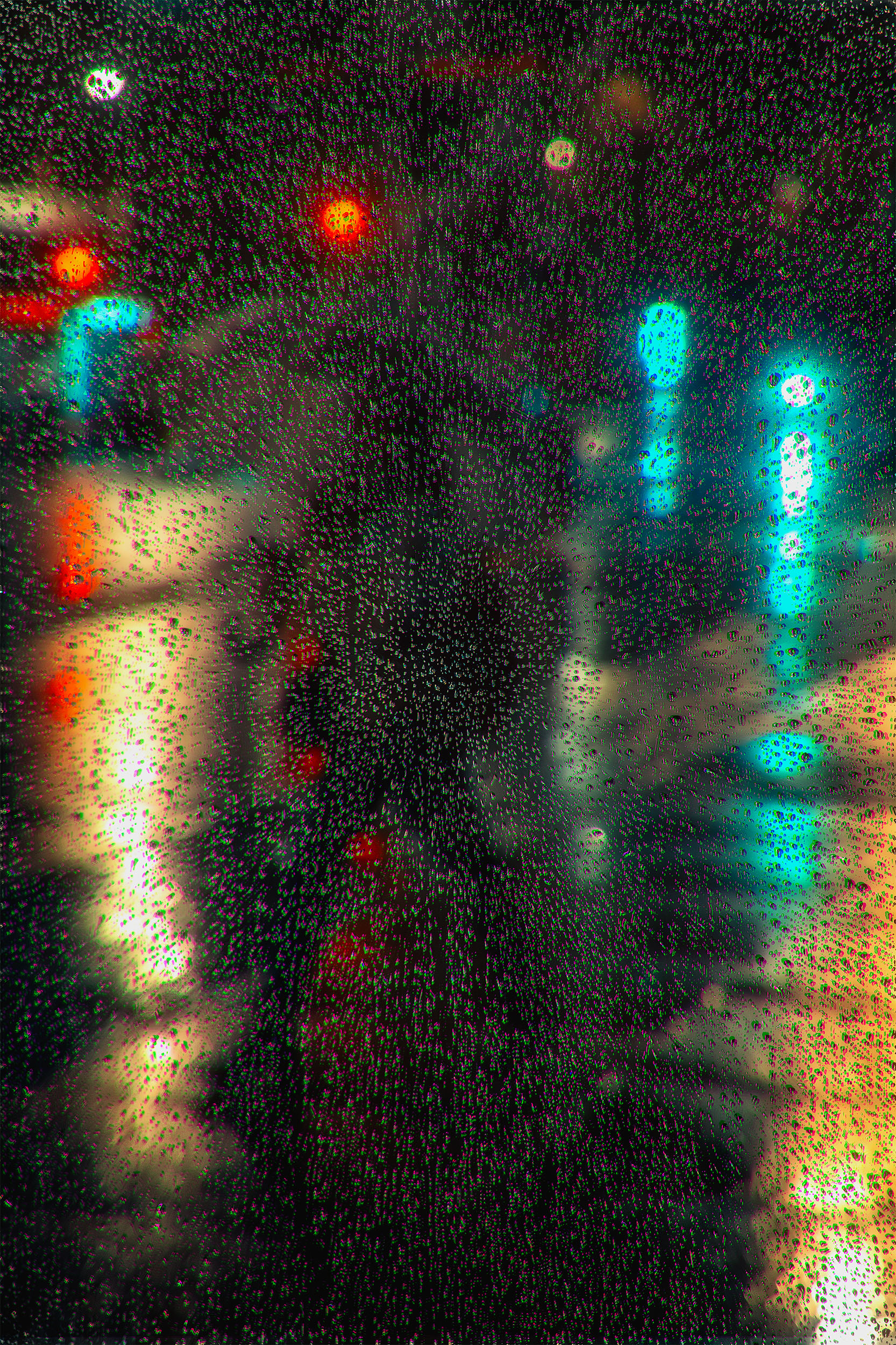 Abstract night photography reflected in a rain-speckled mirror in Madrid, Spain, a blurred silhouette with an umbrella passing behind the camera, red, cyan and amber city lights, bokeh and chromatic aberration, cyberpunk atmosphere